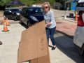 Alice Guppy manhandling cardboard