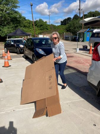 Alice Guppy manhandling cardboard
